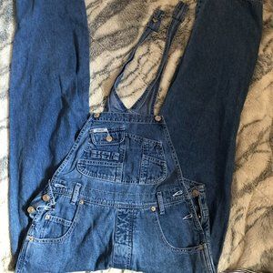 woman blue jeans overalls